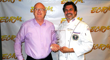 Chef Sam Morgante (right) presents David Smith, Platina’s vice president of retail and program sales and marketing with the Grand Prize award.