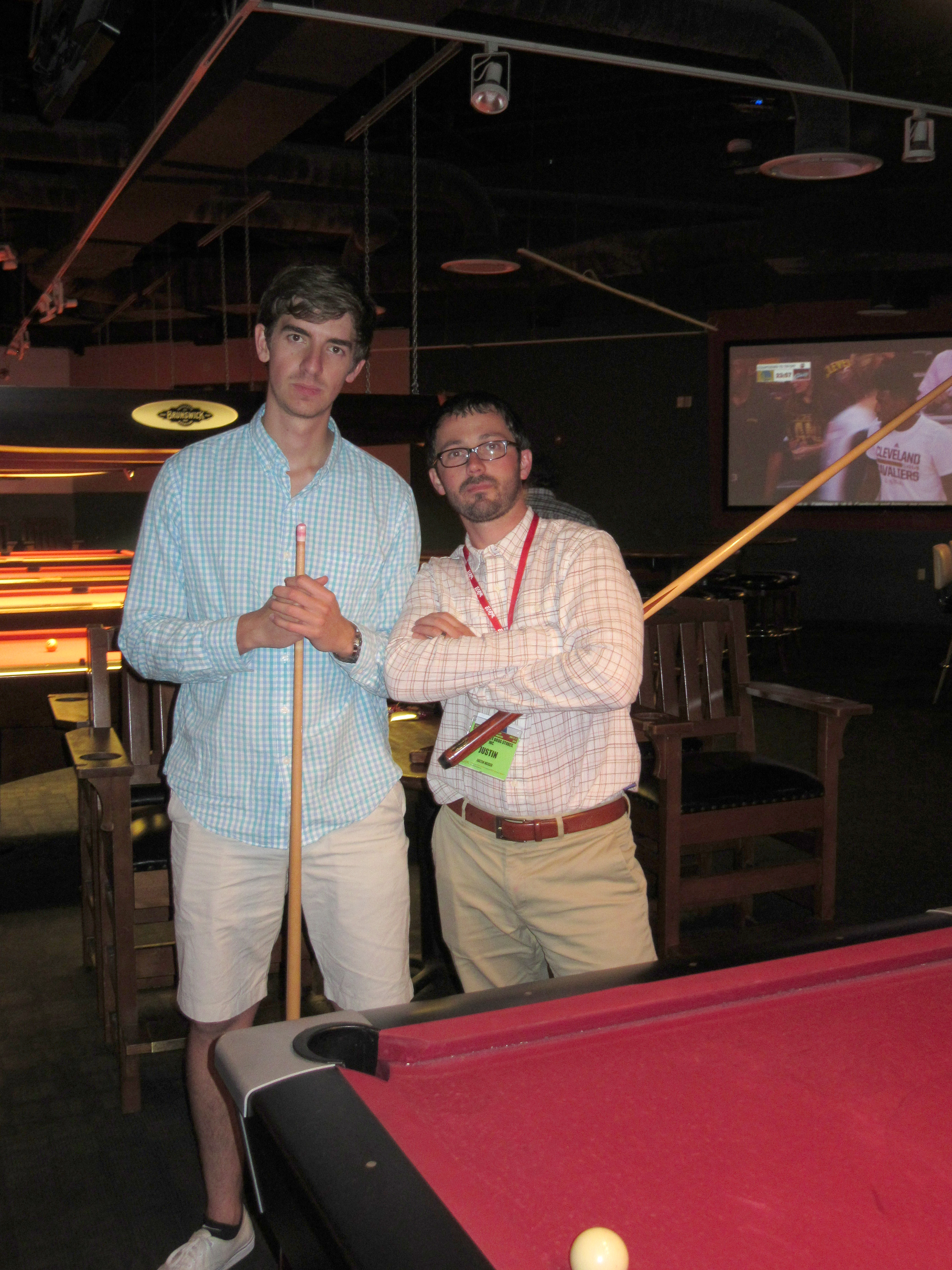 Attendees enjoyed playing some pool during an evening event.