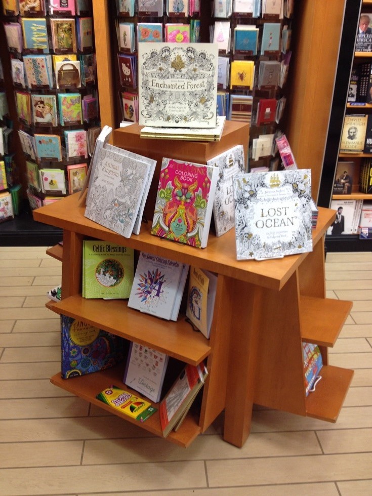 This display was at a book store at CLE airport. It cross-merchandises colored pencils with the coloring books