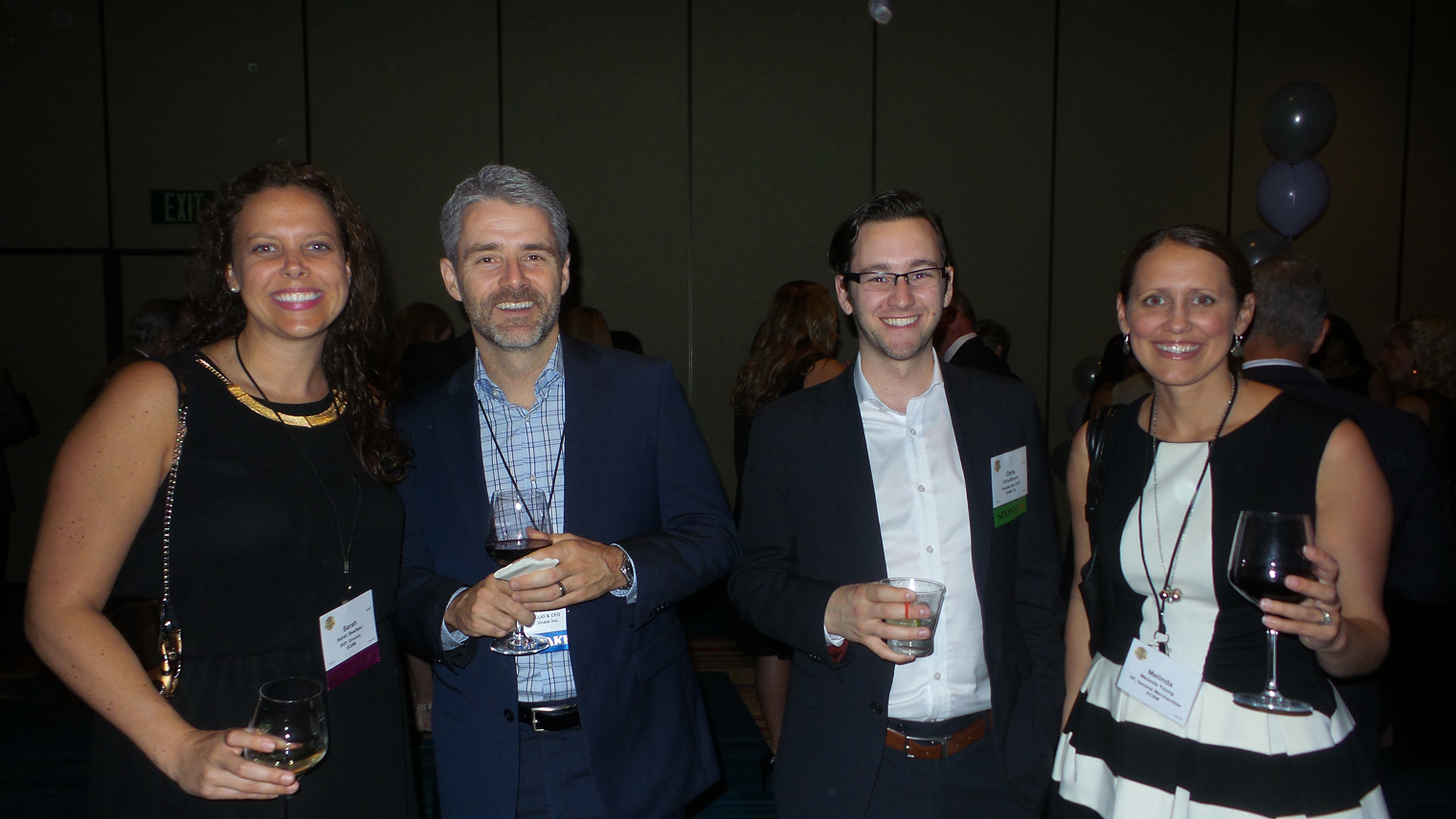 From left: Sarah Sweitzer, Marc Faucher, CFO of event sponsor Unata, Chris Bryson, CEO of Unata, and Melinda Young