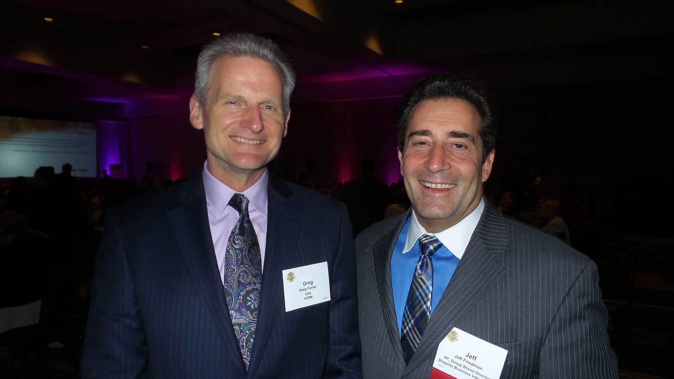 Greg Farrar, ECRM CEO (left), with Jeff Friedman, VP and Group Brand Director of Progressive Grocer