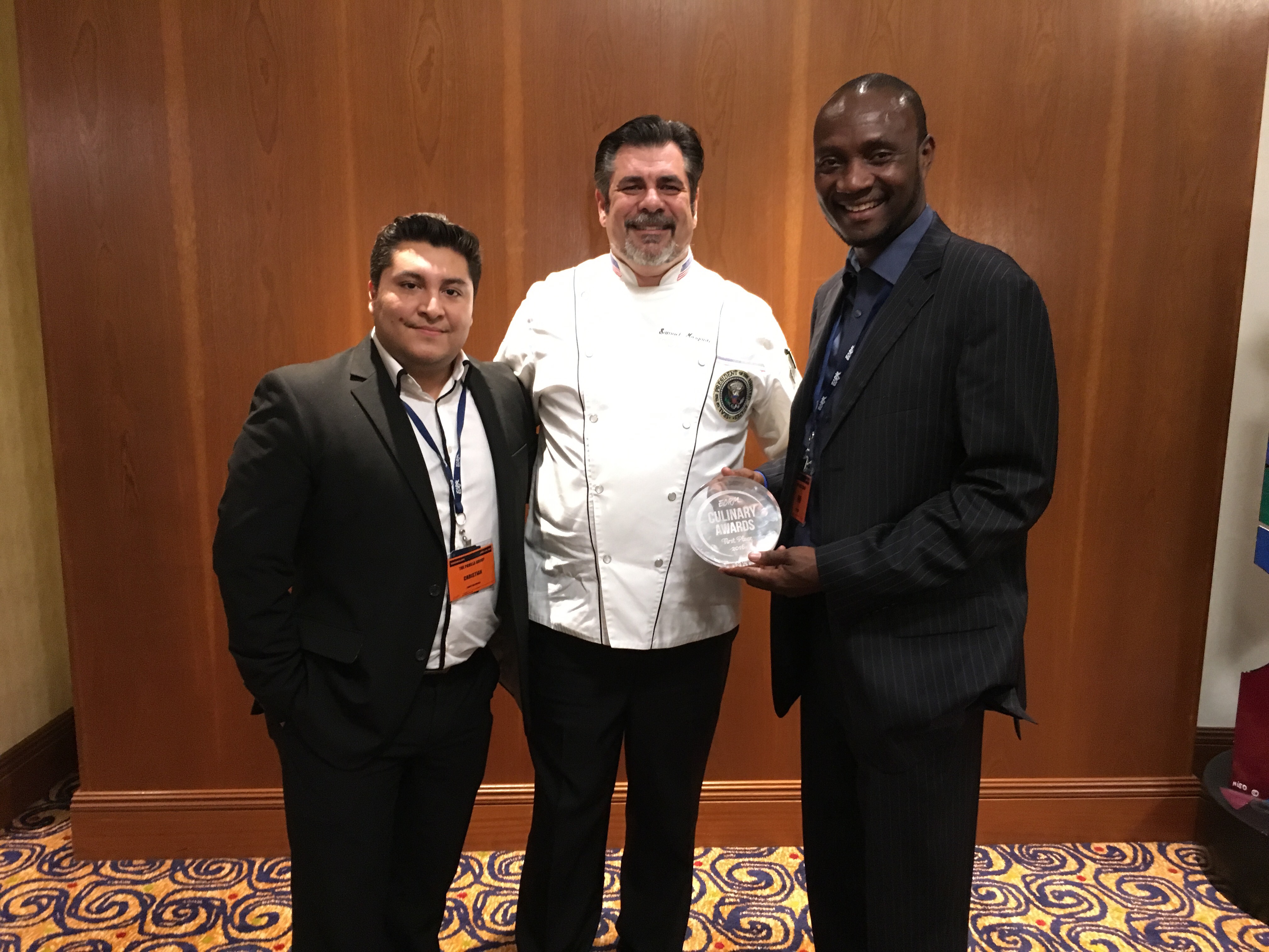 From left: Christian Colula and Ben Uba of First Place winner, The Padilla Group, with Chef Sam Morgante