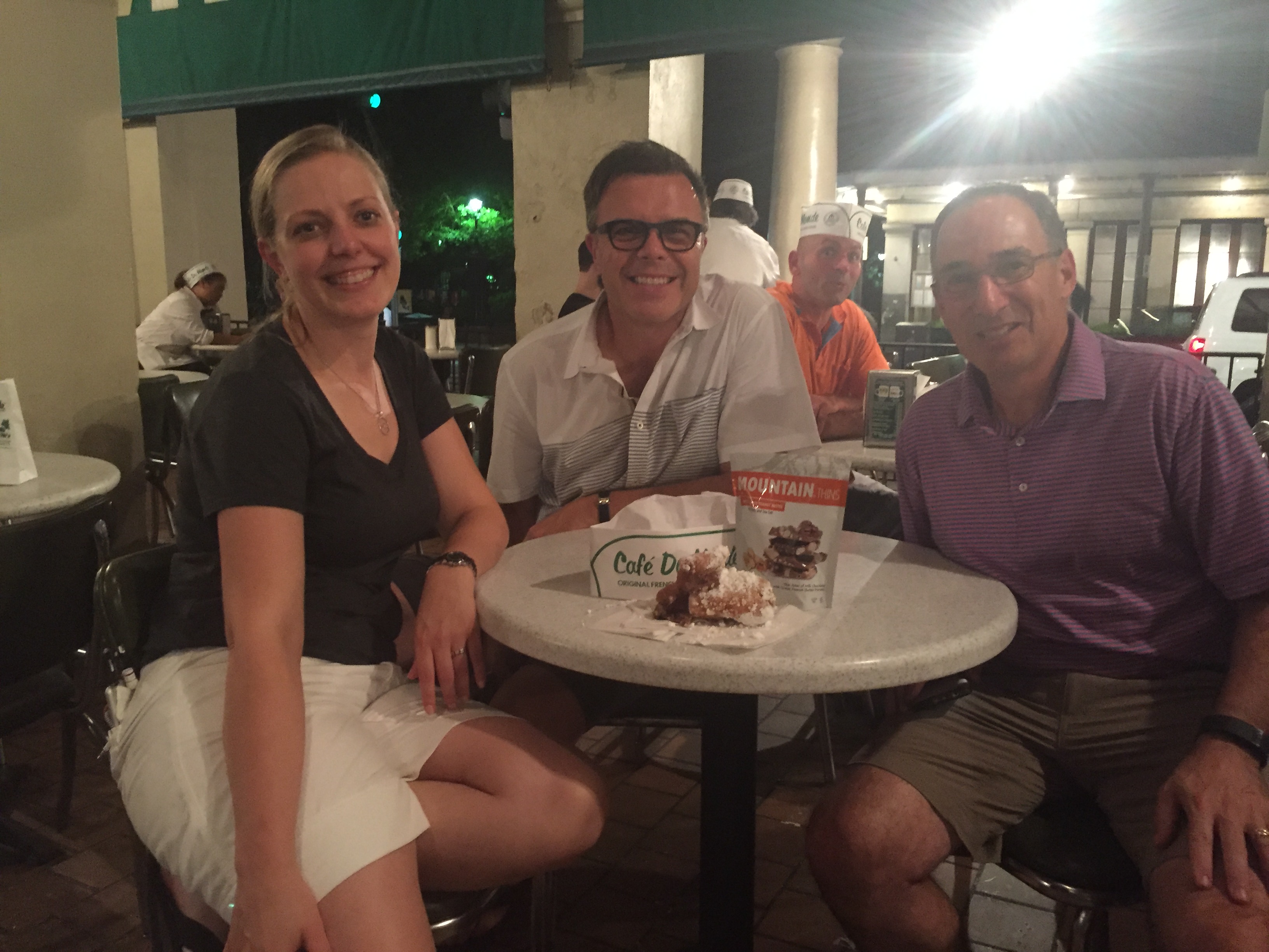 Attendees enjoying a New Orleans late night snack at Cafe Du Monde.