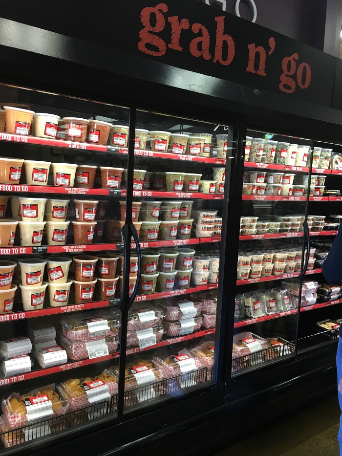 The deli case featured foods from the huge deli department, which is all about service