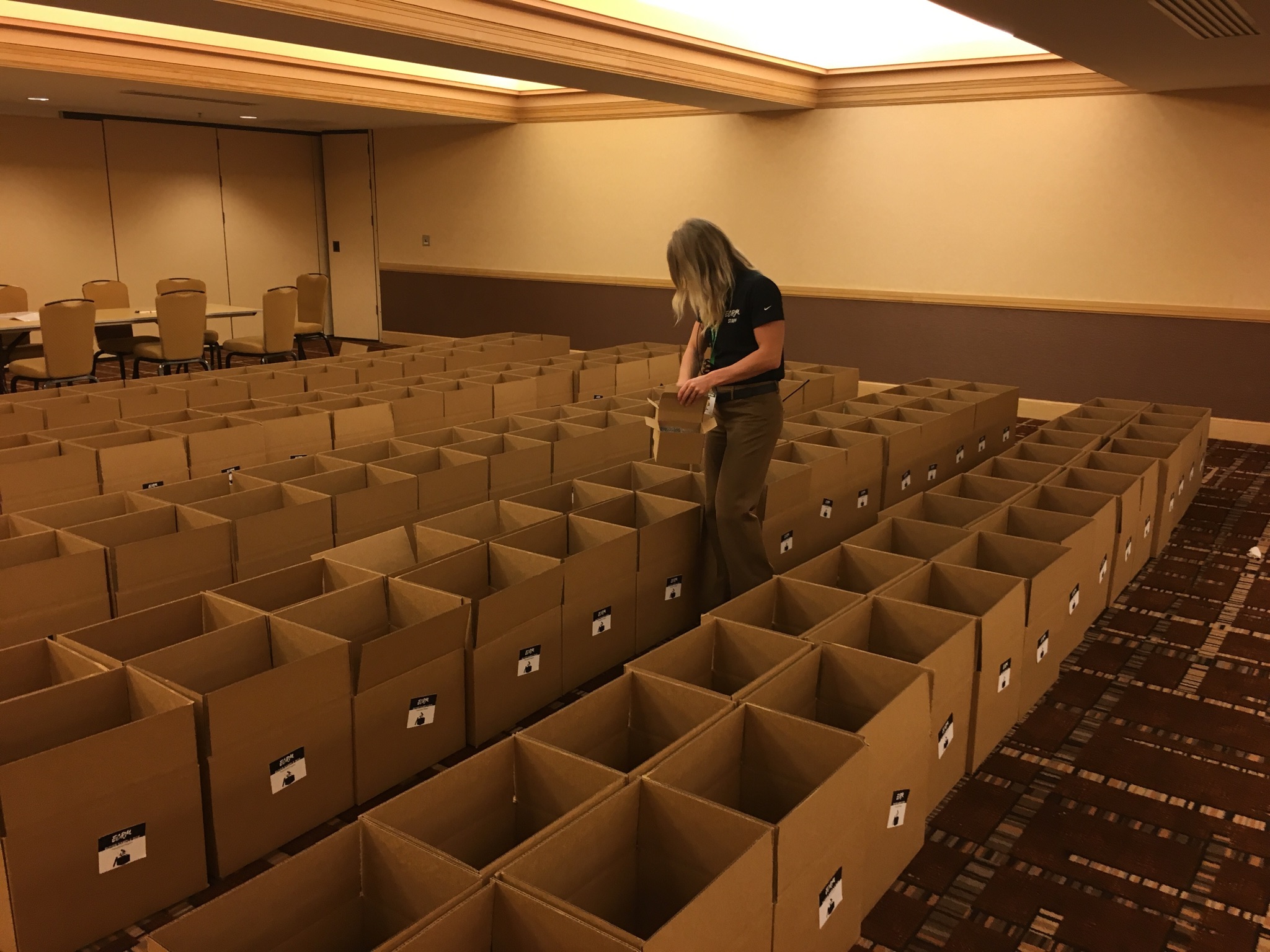 Retailer sample boxes being filled by an ECRM Account Manager