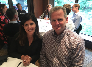 Nicky Jackson, CEO of RangeMe (left) and Greg Farrar, CEO of ECRM at a team dinner last week.