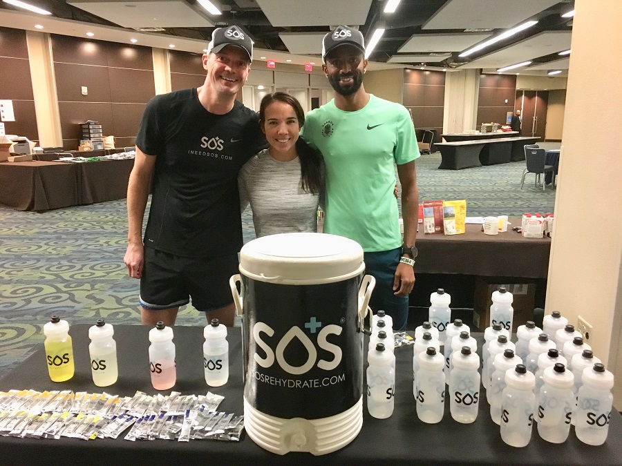 The SOS Hhydration Team with Olympian Hassan Mead
